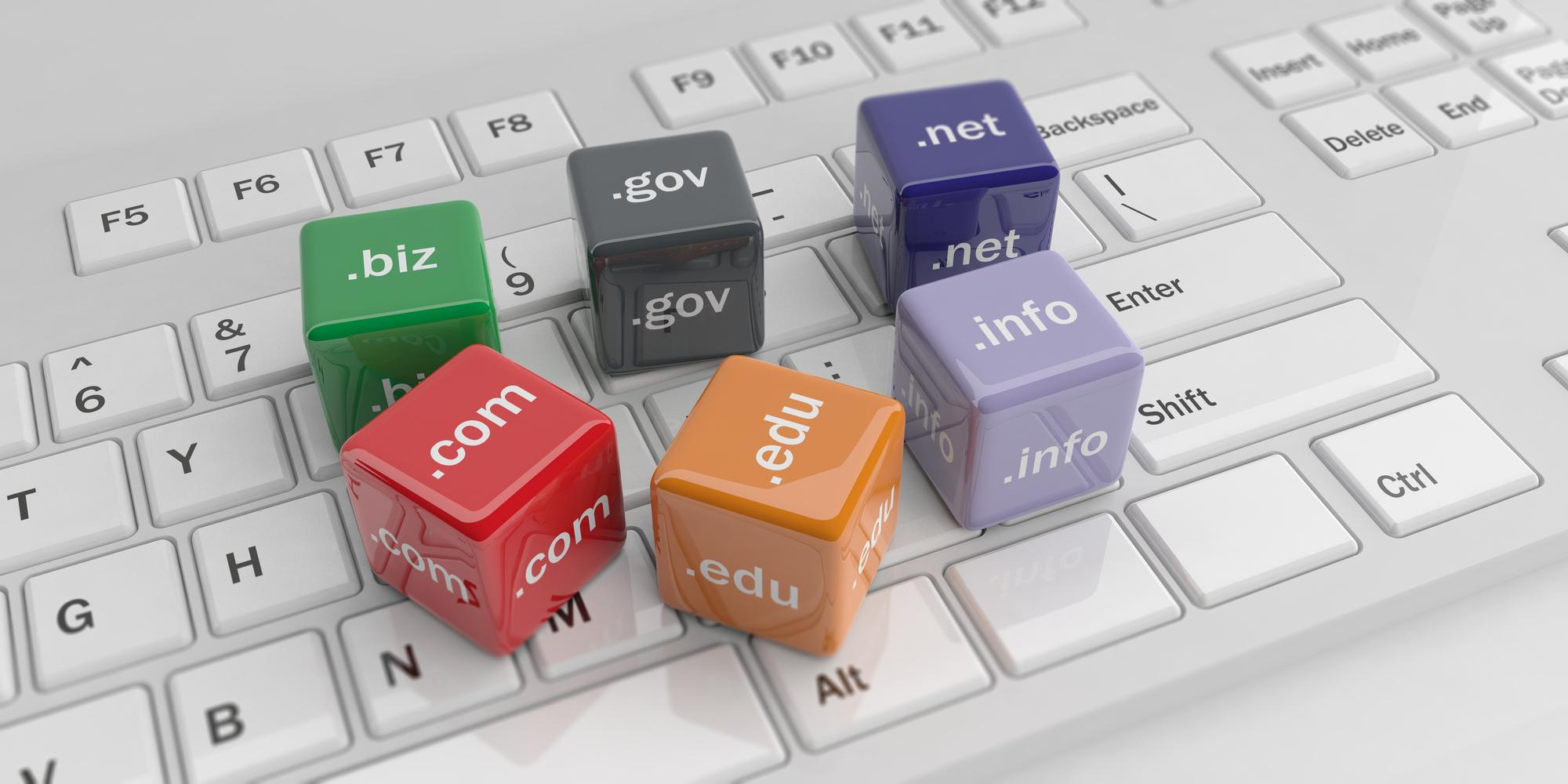 3D Rendering Cubes With Domain Names White Keyboard
