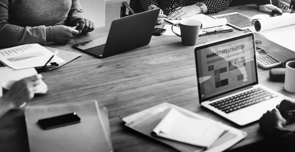 Team Reviewing Progress While Building A Client Website