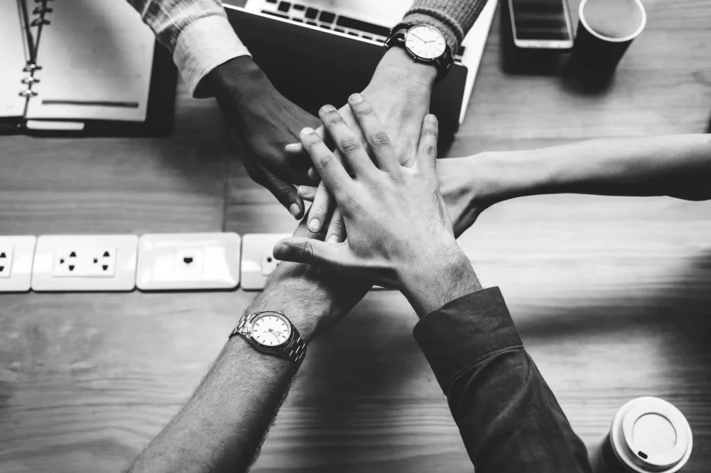 Team Stacking Hands, A Symbol Of Networking That Helps Advance A Design Career
